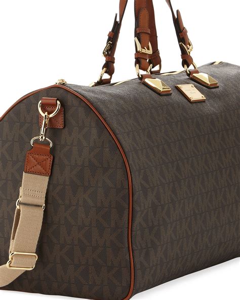 michael kors overnight bag|Michael Kors large suitcase.